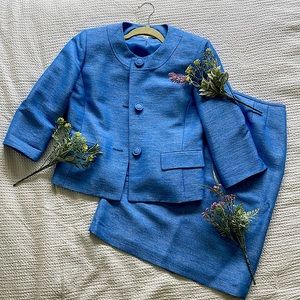 Le Suite light blue jacket and skirt set in size 8P (medium petite).